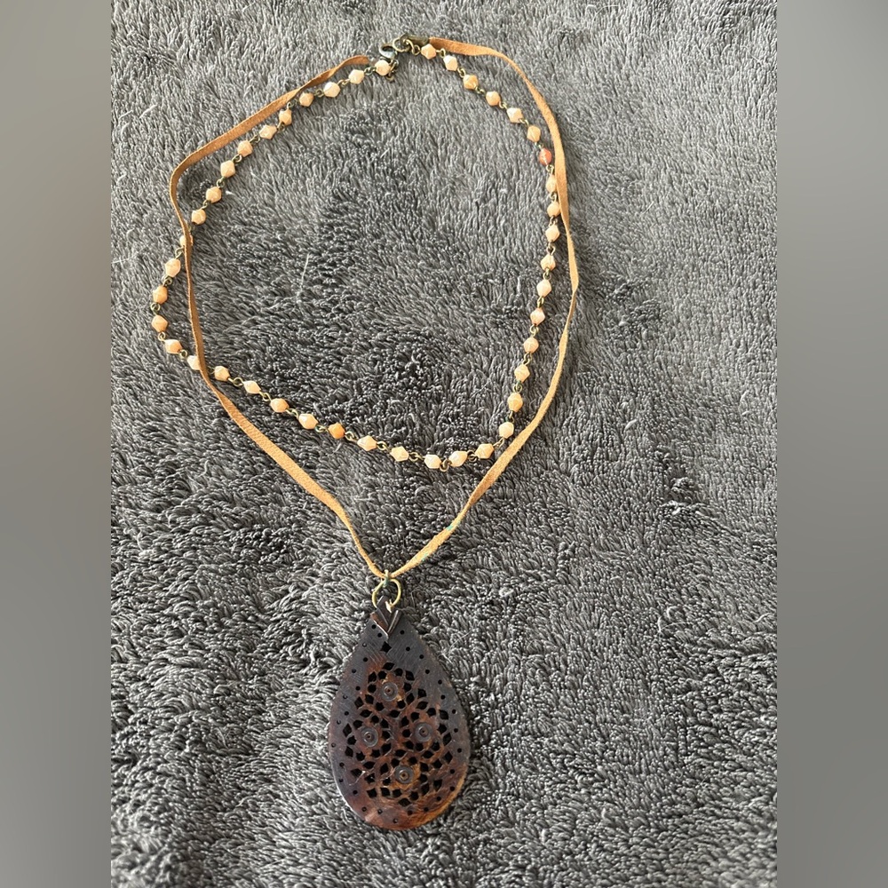 2/$20 90s necklace with carved pendant